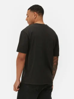 Un T-shirt Graphique Orange Mécanique|Primark Discount